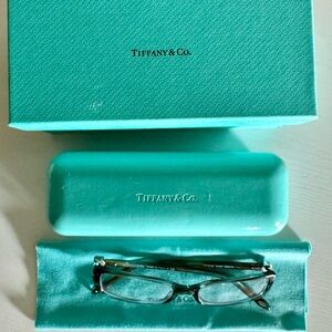Tiffany & Co pair of reading glasses. Comes with box, cases, and cleaning cloth.